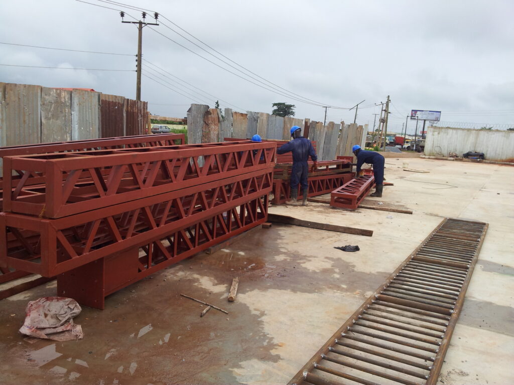 Fabrication of station canopy trusses in Benin, Edo State.